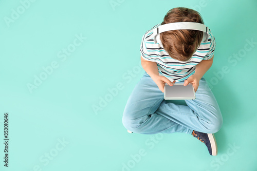 Cute little boy with tablet...
