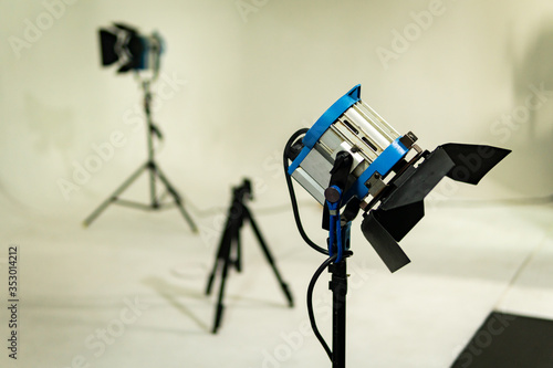 Принти на полотні Old vintage fresnel light on tripod in a film, television or photography studio