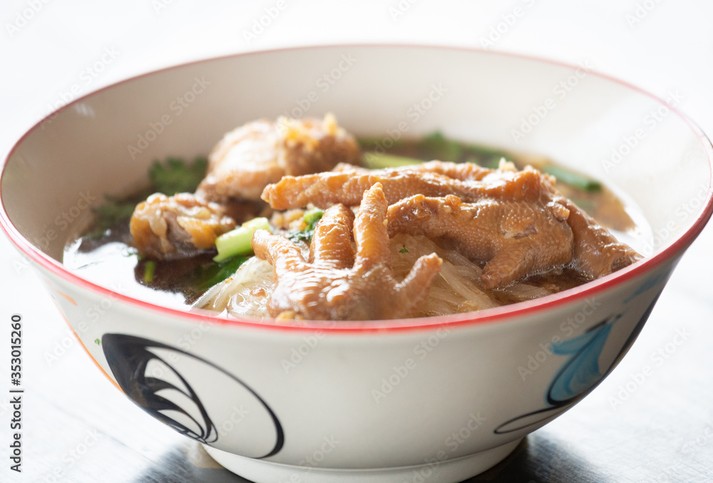 Hot chicken noodle in white bowl, Street food of Thailand. Hot chicken noodle in white bowl, Street food of Thailand.