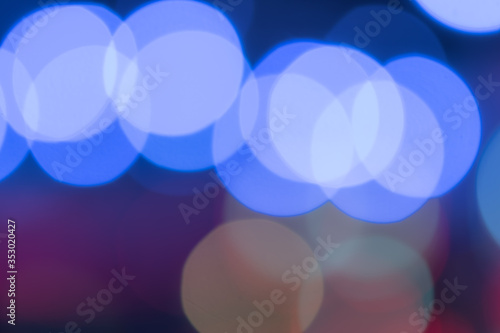 Blue bokeh big red abstract background caused by light bulb