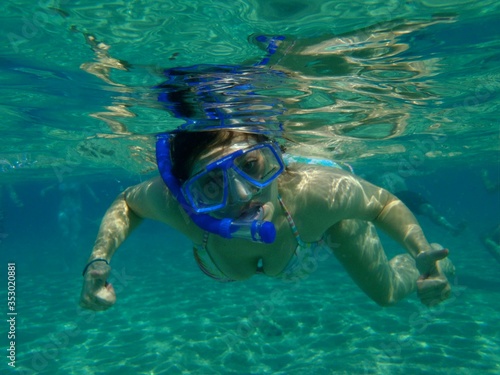 Woman snorkeling in the ocean