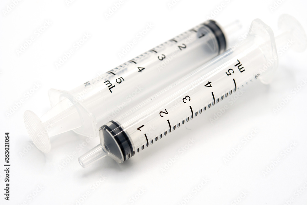 Syringe and isolated on a white background. Syringe and isolated on a white background.