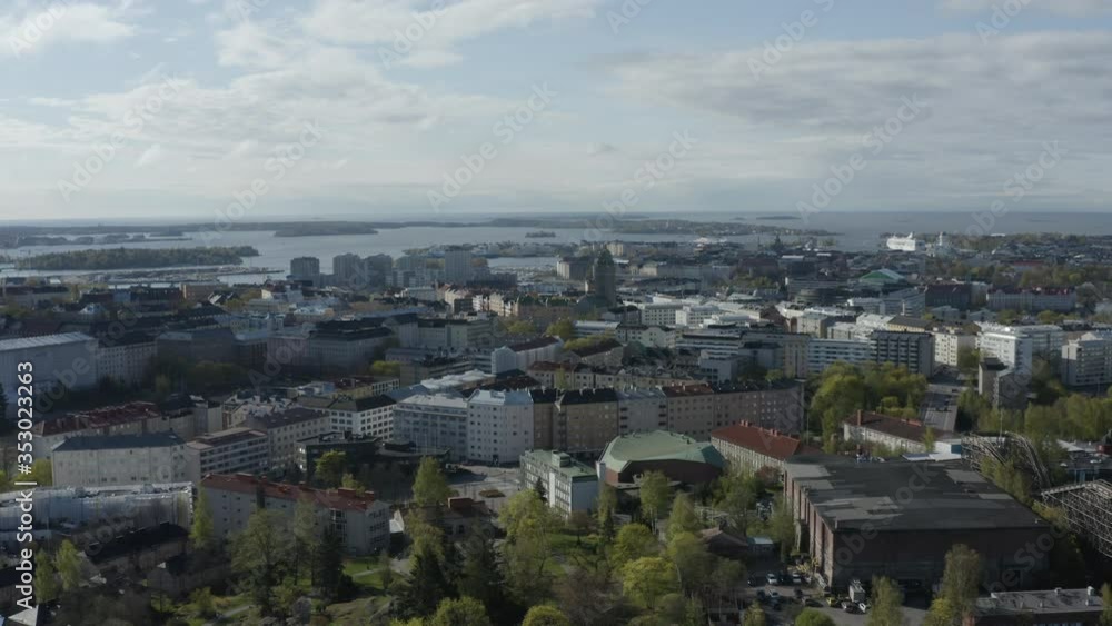 Flying over the city of Helsinki in sunny day. Downtown aerial drone shot. Buildings and architecture. Flying over the city of Helsinki in sunny day. Downtown aerial drone shot. Buildings and architecture.