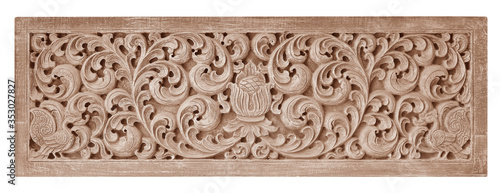 Фотография Pattern of flower carved on wood background