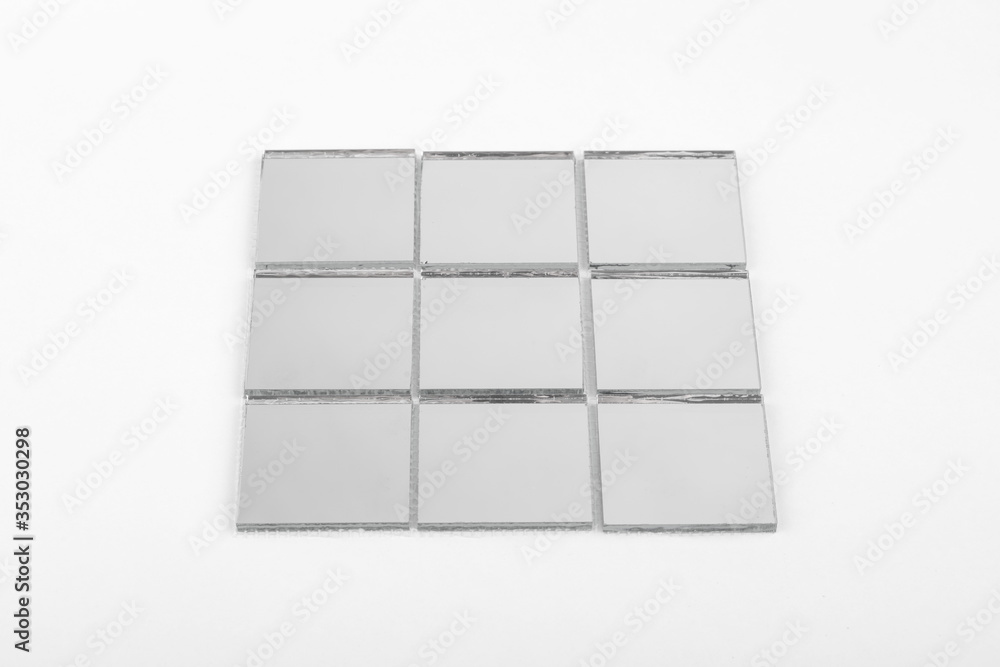 Glass and mirror mosaic without reflections isolated on a white background. For construction and repair in the bathroom, pool, kitchen. Glass and mirror mosaic without reflections isolated on a white background. For construction and repair in the bathroom, pool, kitchen.