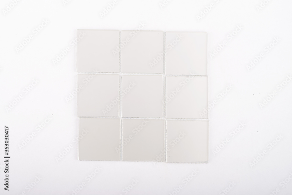 Glass and mirror mosaic without reflections isolated on a white background. For construction and repair in the bathroom, pool, kitchen. Glass and mirror mosaic without reflections isolated on a white background. For construction and repair in the bathroom, pool, kitchen.