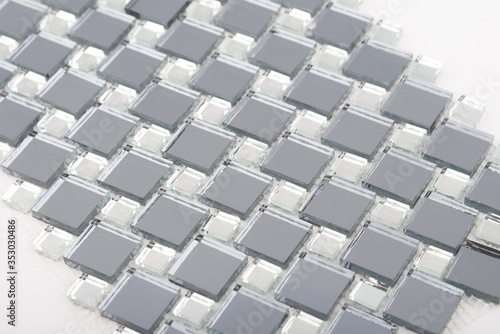 Glass and mirror mosaic without reflections isolated on a white background. For construction and repair in the bathroom  pool  kitchen.