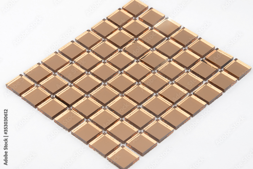 Glass and mirror mosaic without reflections isolated on a white background. For construction and repair in the bathroom, pool, kitchen. Glass and mirror mosaic without reflections isolated on a white background. For construction and repair in the bathroom, pool, kitchen.