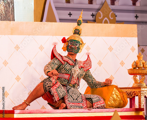 Face mask with traditional thai costume in Bangkok, Thailand photo