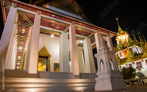 Wat Ratchanatdaram Woravihara night view (Ratcha Natdaram Worawihan - Loha Prasat), Bangkok, Thailand photo