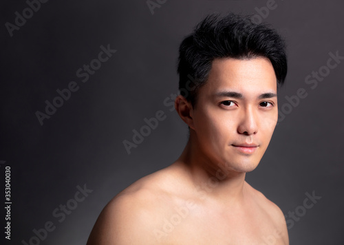 Closeup of attractive young asian man face