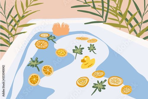Woman taking a bath in the beautiful decorated bathtube