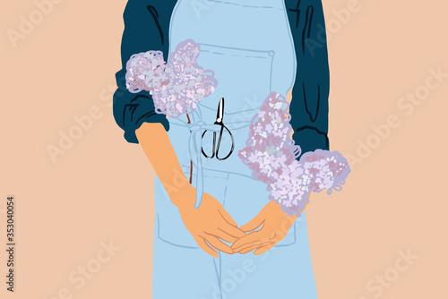 Woman in apron with flowers