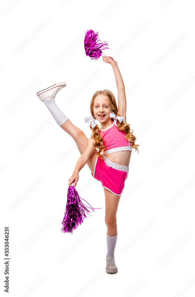 cute girl in pink cheerleader clothes dancing with shiny pompons in her hands cute girl in pink cheerleader clothes dancing with shiny pompons in her hands