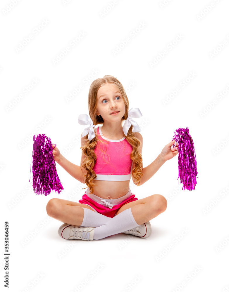 cute long-haired girl in a pink tank top and cheerleader clothes sitting cross-legged cute long-haired girl in a pink tank top and cheerleader clothes sitting cross-legged