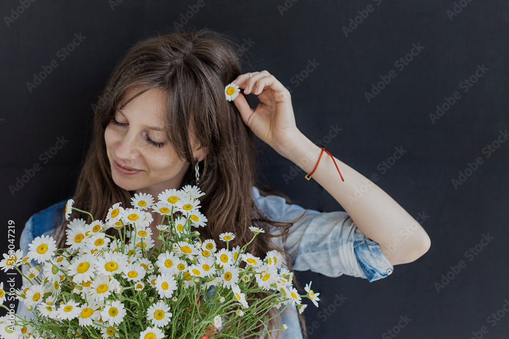 girl with a bouquet of seasonal daisies girl with a bouquet of seasonal daisies