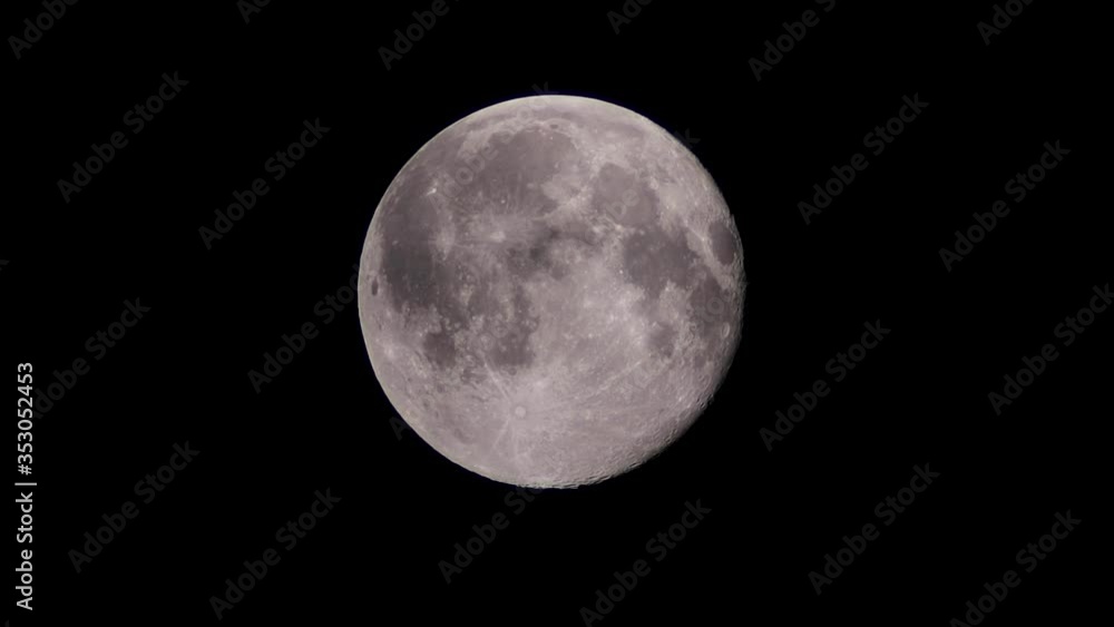 Full super winter moon in cloudy night sky Full super winter moon in cloudy night sky