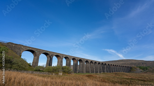 Wide angle view of the iconic landmark Ribblehead Viaduct in the yorkshire dales national park yorkshire  england