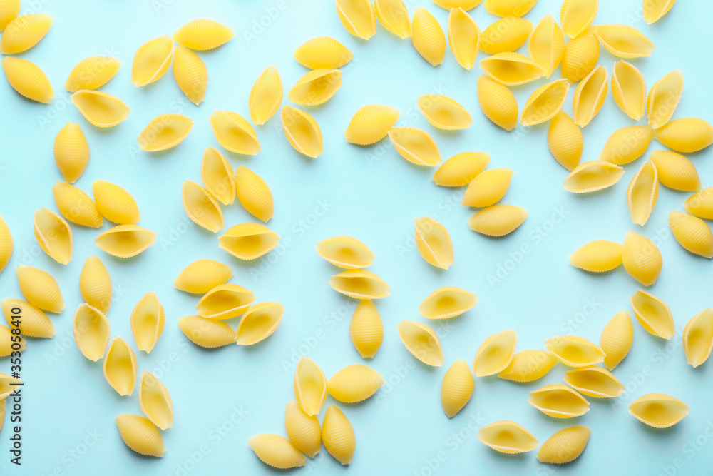 Uncooked pasta on color background Uncooked pasta on color background