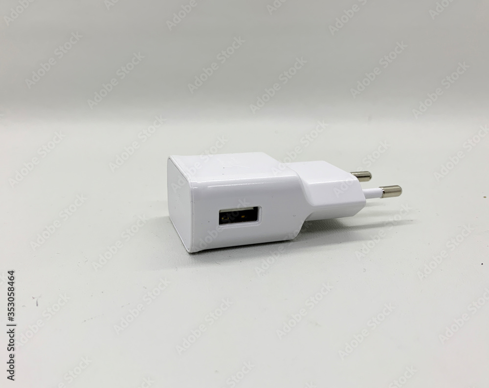 White plug charger isolated on white background White plug charger isolated on white background