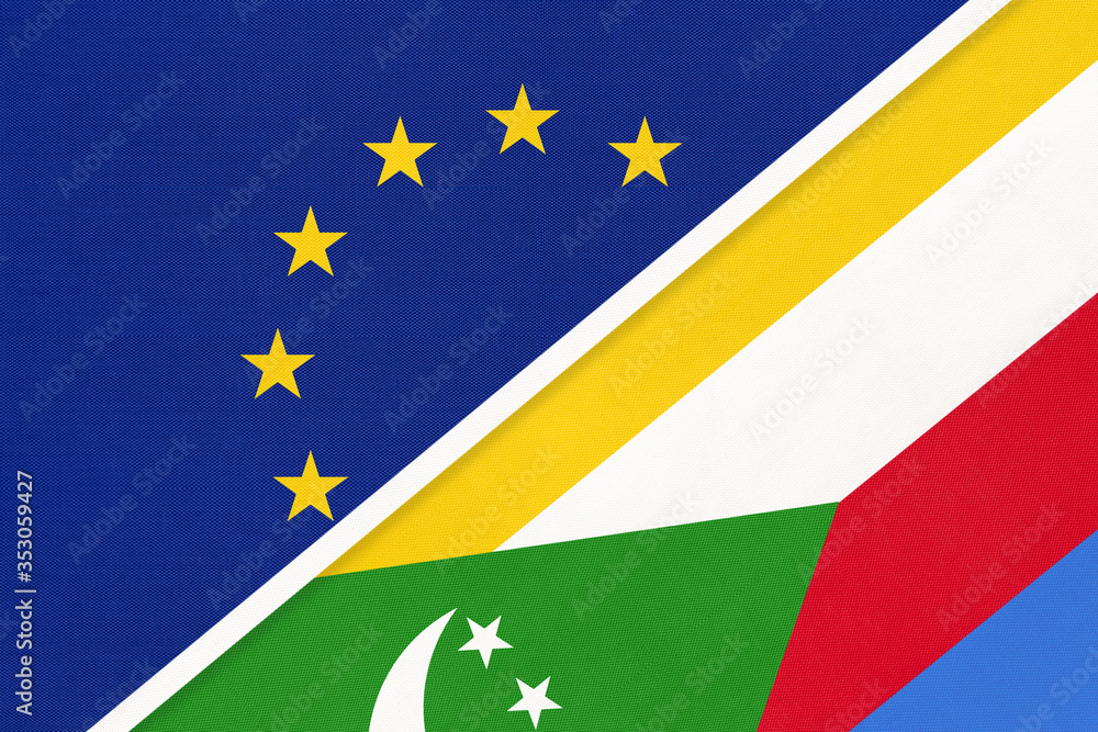 European Union or EU and Comoros national flag from textile. Symbol of the Council of Europe association. European Union or EU and Comoros national flag from textile. Symbol of the Council of Europe association.