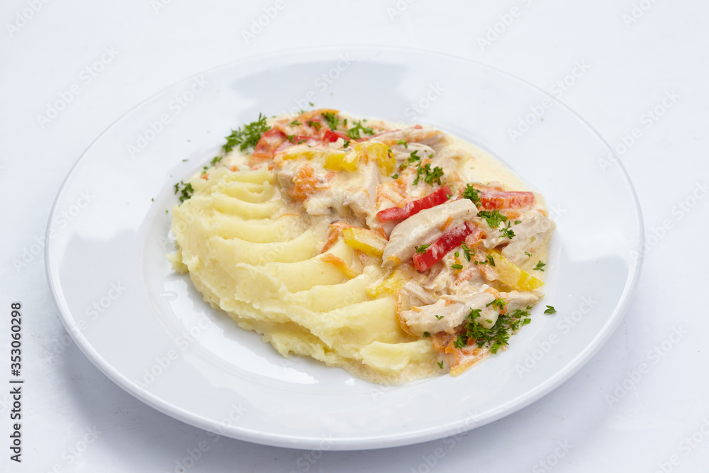 potato with meat on white plate