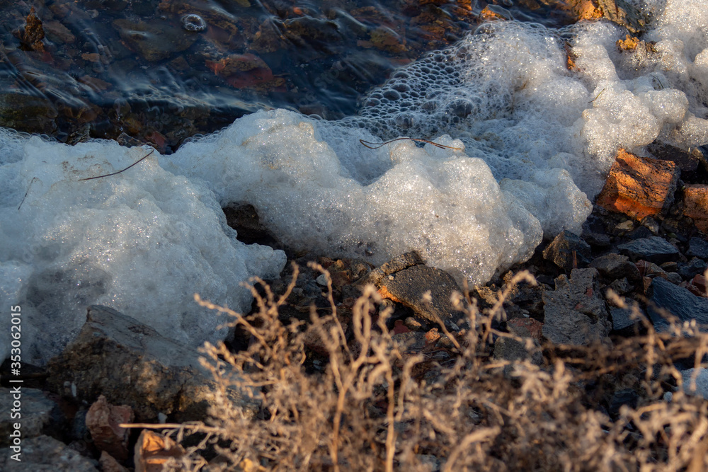 Foam series on the shore of the lake. Salt Lake's crystalline waters discard chemicals that people have dumped back on their shores. Pomorie, Bulgaria. Foam series on the shore of the lake. Salt Lake's crystalline waters discard chemicals that people have dumped back on their shores. Pomorie, Bulgaria.