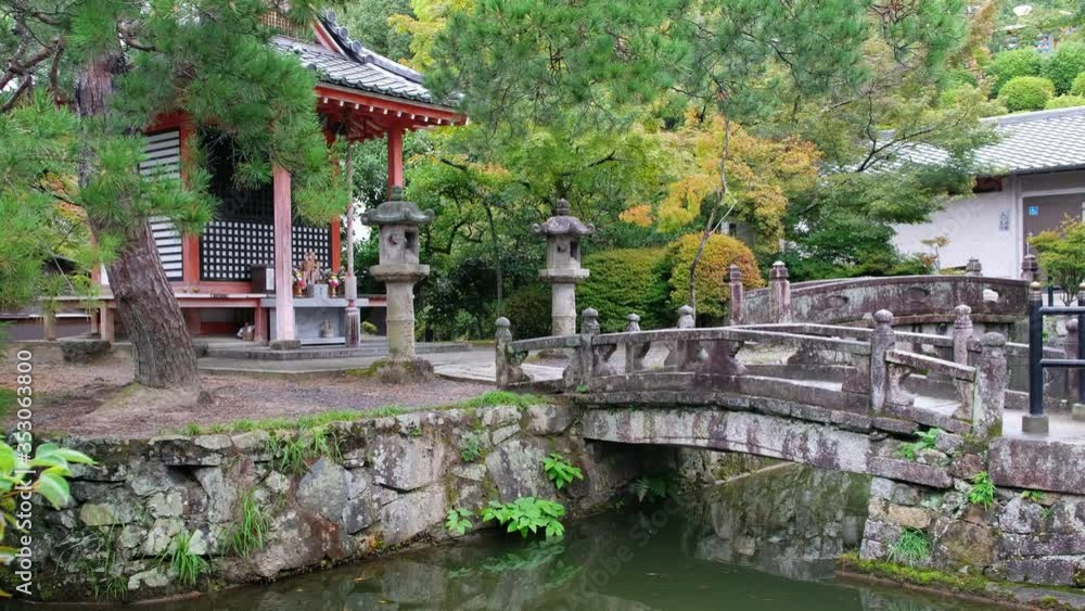 The stone bridges to the small shrine. Kiyomizu-dera Temple. Kyoto. Japan The stone bridges to the small shrine. Kiyomizu-dera Temple. Kyoto. Japan