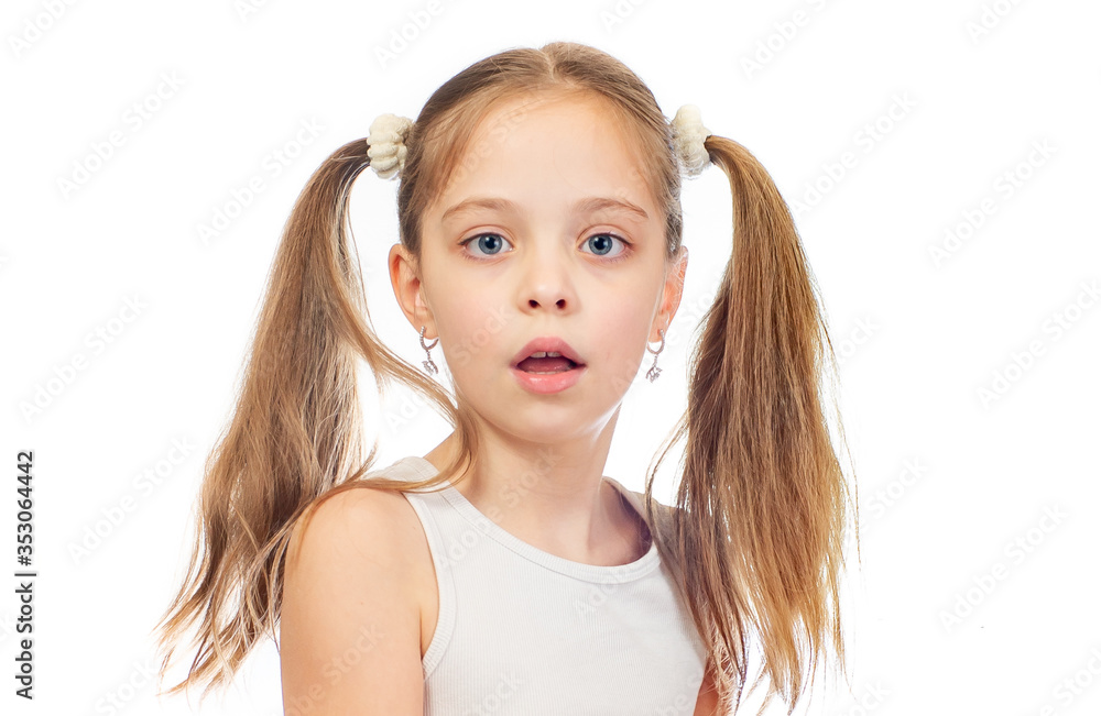 Young cute bemused puzzled girl with grey blue eyes and two hair tails isolated on white background Young cute bemused puzzled girl with grey blue eyes and two hair tails isolated on white background
