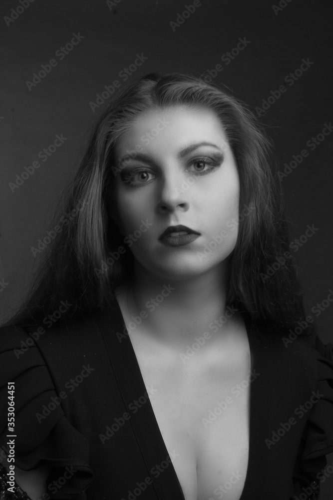 Black and white portrait of young fat girls brunette with long hairblack dress with sweetheart neckline Black and white portrait of young fat girls brunette with long hairblack dress with sweetheart neckline