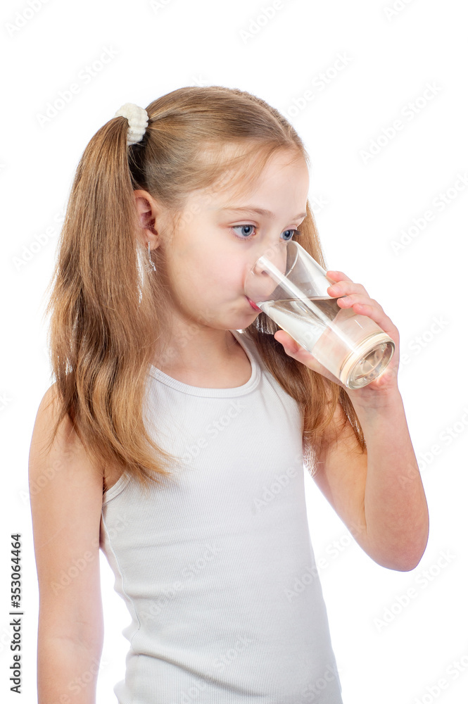 Young cute girl with grey blue eyes and two hair tails drinks water isolated on white background Young cute girl with grey blue eyes and two hair tails drinks water isolated on white background