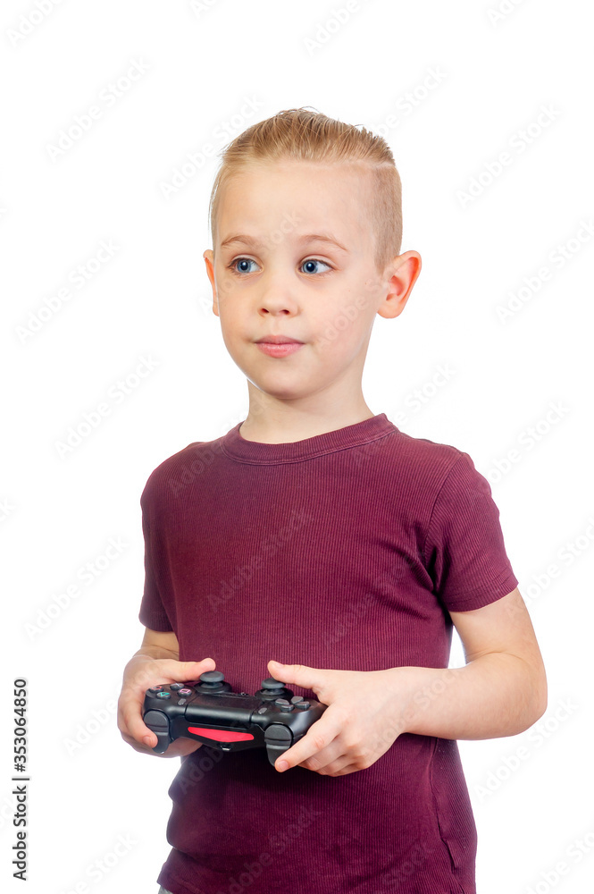 Young handsome caucasian boy plays computer games with joystick isolated on white background Young handsome caucasian boy plays computer games with joystick isolated on white background