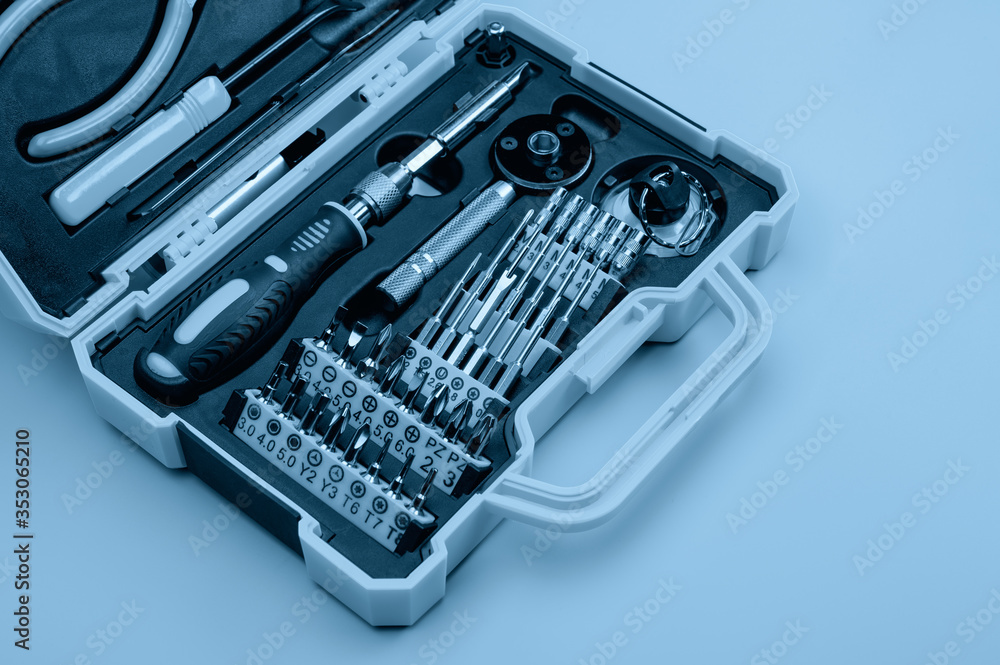 . A set of professional tools in a case for repairing phones, smartphones, computers and other office equipment. . A set of professional tools in a case for repairing phones, smartphones, computers and other office equipment.