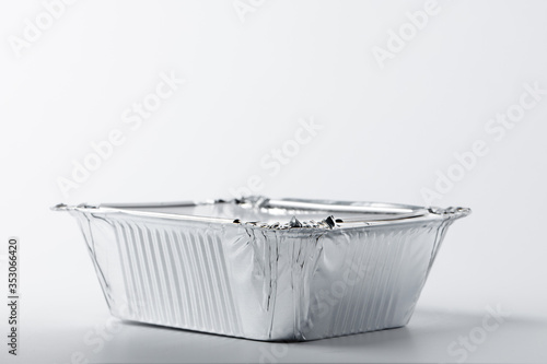 Bilde på lerret Foil food box with takeaway meal on white background