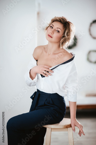Attractive elegant senior woman with natural beauty in basic clothes