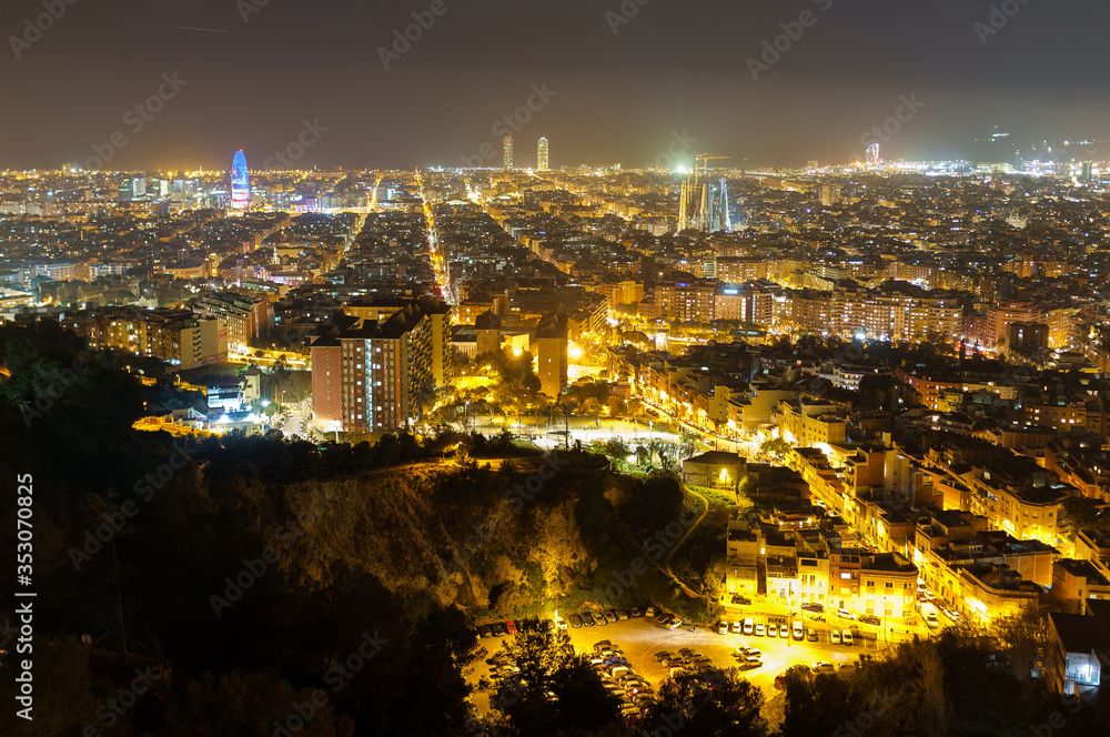 View from the top of Park Guinardo, one of the east side hills in Barcelona. The night skyline of Barcelona. 
