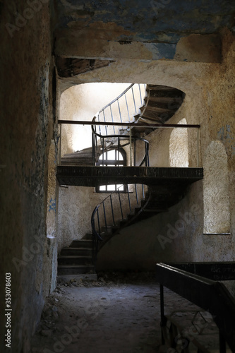 Spiral staircase in abandoned building