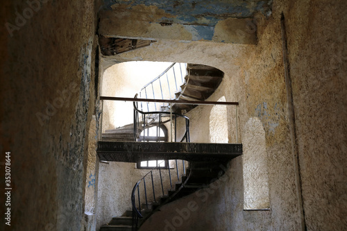 View of spiral staircase in abandoned building