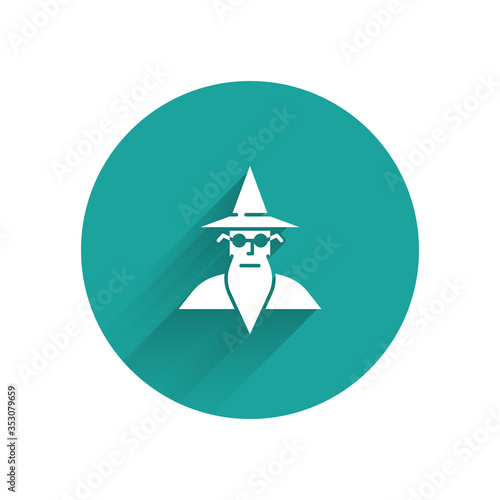 White Wizard warlock icon isolated with long shadow. Green circle button. Vector Illustration