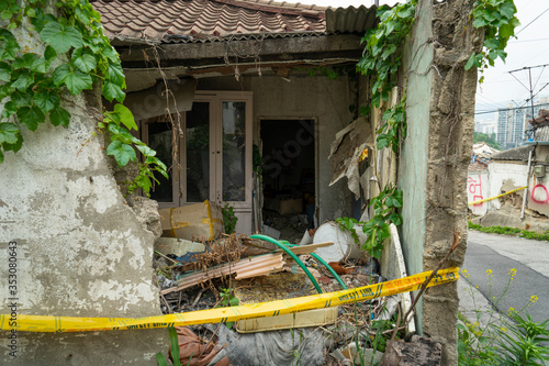 Seoul's last shanty town. Known as Village 104 it is only half filled with residents who live among empty neighbors waiting for demolition.  photo