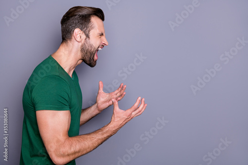 Cuadro en lienzo Profile photo of attractive crazy guy neat hairdo bristle raise arms yelling fur