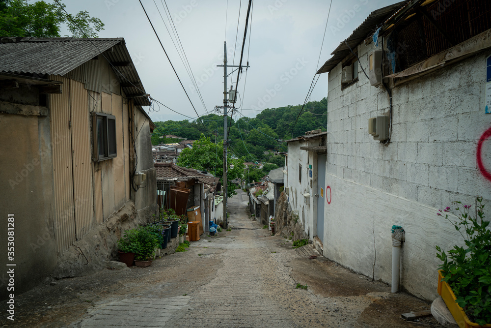 Seoul's last shanty town. Known as Village 104 it is only half filled with residents who live among empty neighbors waiting for demolition. 