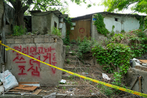 Seoul's last shanty town. Known as Village 104 it is only half filled with residents who live among empty neighbors waiting for demolition.  photo