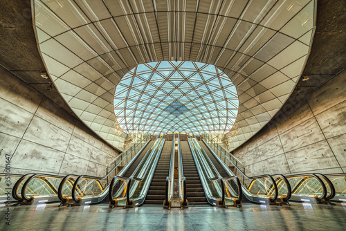 Fotografie Triangeln Station modern entrance with escalators and glazed vault is empty due to the COVID outbreak (Corona Virus)