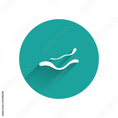 White Ebola virus disease icon isolated with long shadow. Green circle button. Vector Illustration