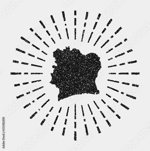 Vintage map of Ivory Coast. Grunge sunburst around the country. Black Ivory Coast shape with sun rays on white background. Vector illustration.