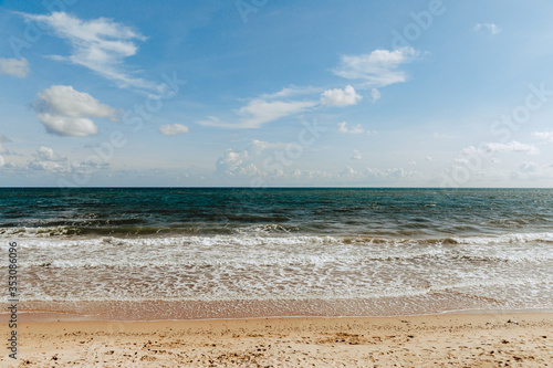 Fototapeta Naklejka Na Ścianę i Meble -  Summer beach, beautiful sky and white clouds