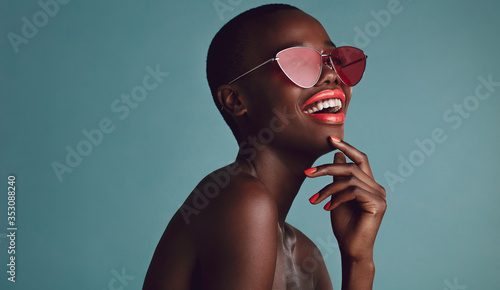 African female model with funky sunglasses photo