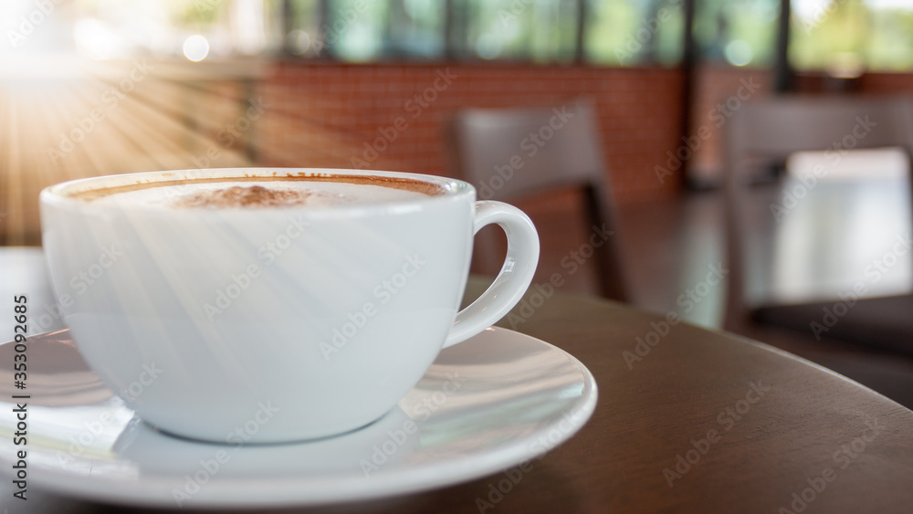 Coffee cup of cappuccino in cafe in an empty cafe without people. Coffee cup of cappuccino in cafe in an empty cafe without people.