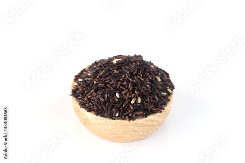 Brown rice in a wooden cup